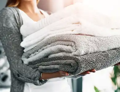 Folded Laundry Shutterstock 2480453893
